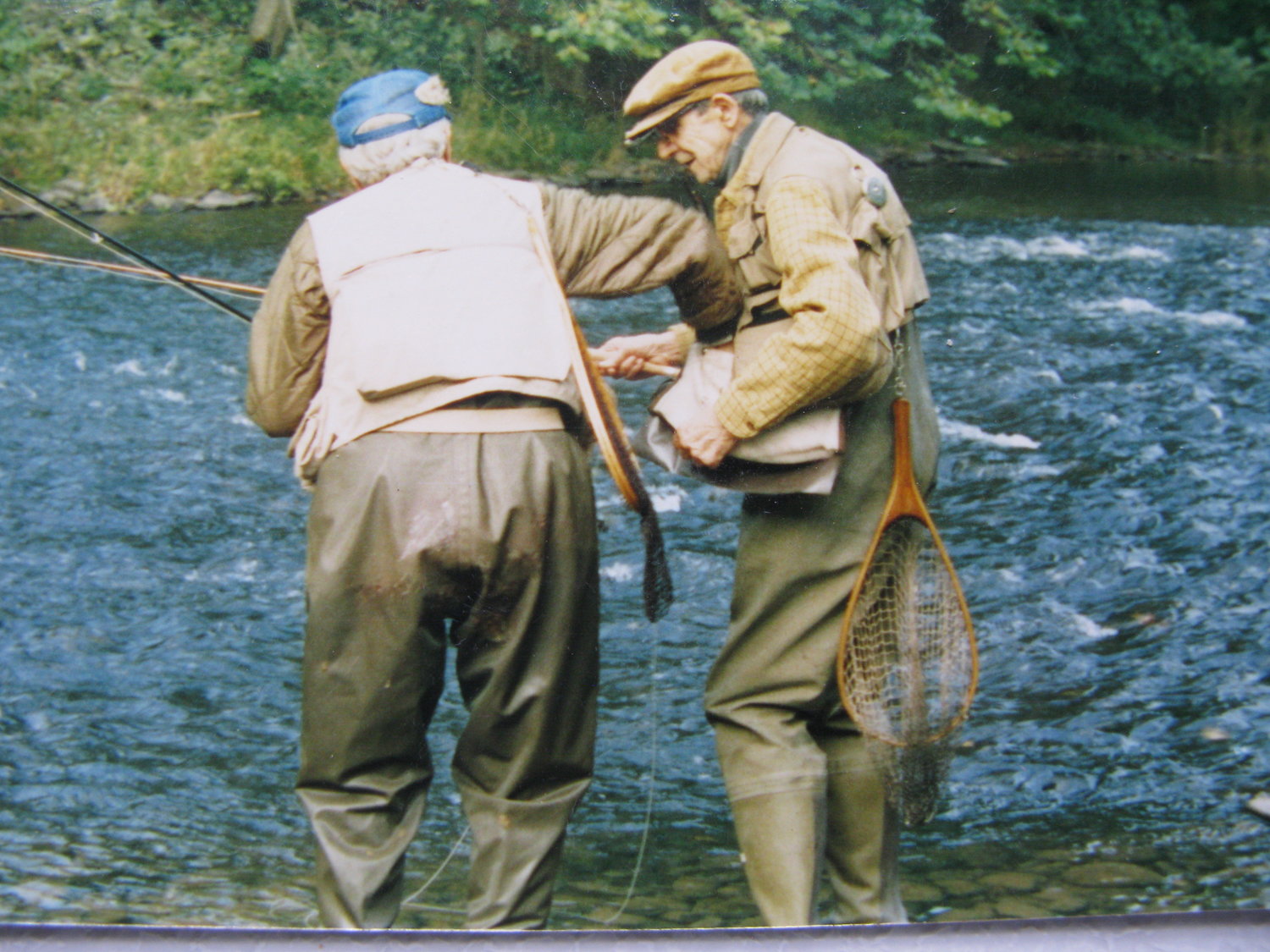 Old friends selecting flies for the evening rise on the Burnt House Pool.